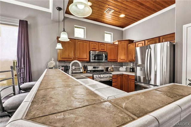 kitchen featuring pendant lighting, visible vents, appliances with stainless steel finishes, wood ceiling, and a peninsula