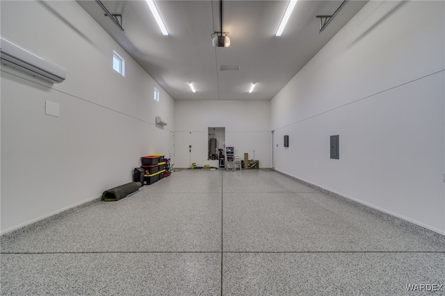 garage featuring a wall mounted AC