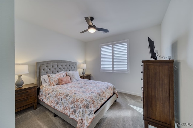 carpeted bedroom with baseboards, visible vents, and ceiling fan