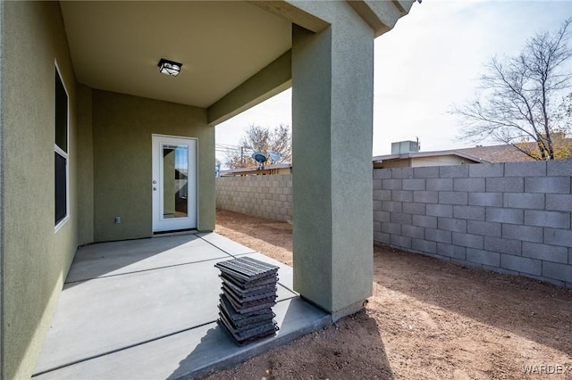 view of patio with fence