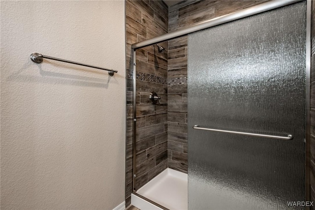 bathroom featuring a stall shower