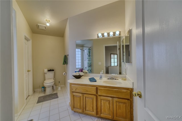 full bathroom with tile patterned flooring, visible vents, vanity, and toilet