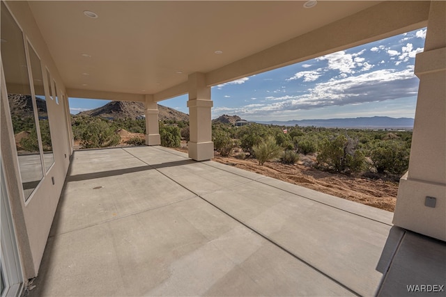 view of patio with a mountain view