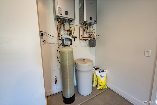 utility room featuring tankless water heater