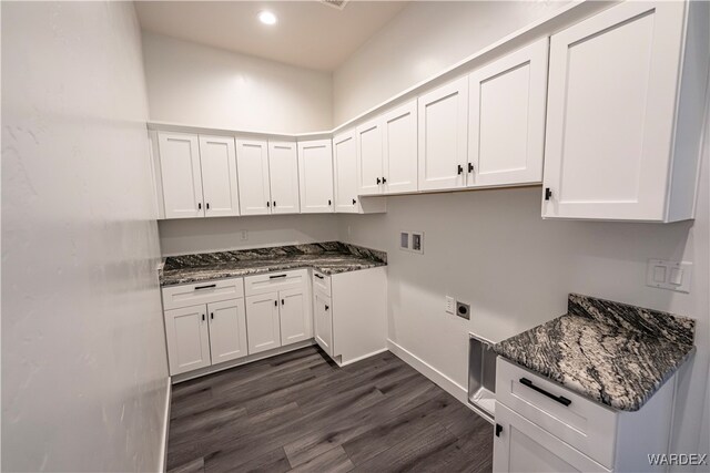 laundry area featuring hookup for a washing machine, recessed lighting, dark wood-type flooring, cabinet space, and electric dryer hookup