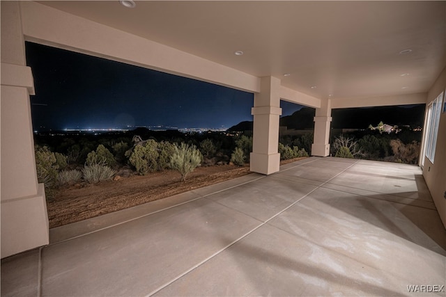 view of patio at twilight