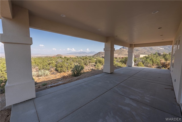 view of patio with a mountain view