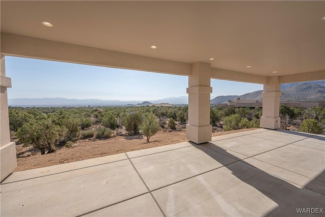 view of patio featuring a mountain view