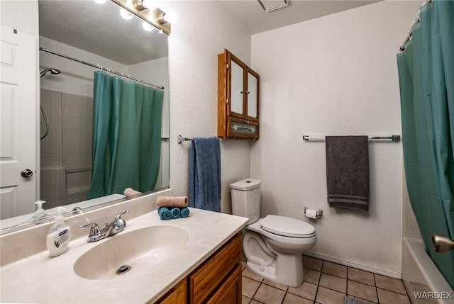 full bathroom featuring toilet, shower / bath combo, tile patterned flooring, and vanity