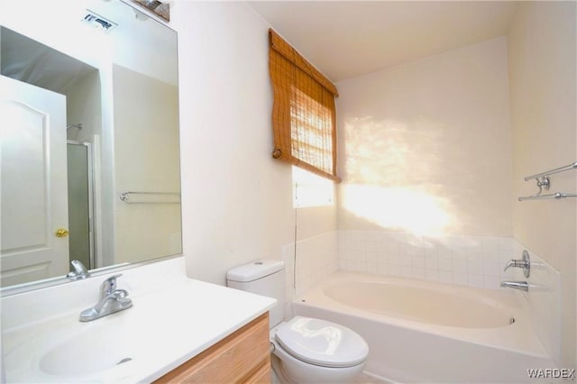 full bathroom with toilet, a bathing tub, vanity, visible vents, and walk in shower