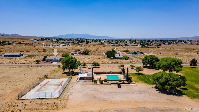 drone / aerial view featuring a mountain view