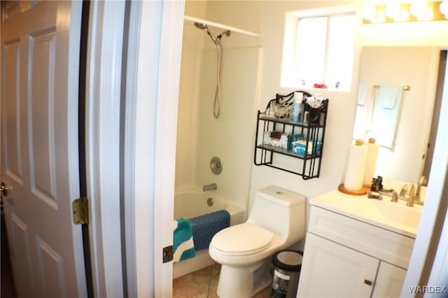 bathroom with toilet, bathing tub / shower combination, tile patterned flooring, and vanity