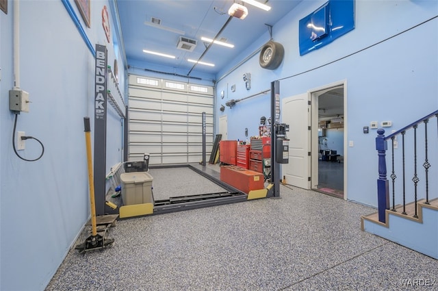 garage featuring visible vents