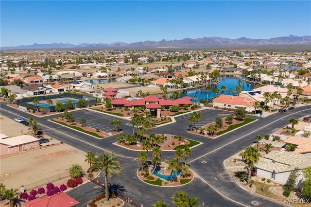 aerial view with a residential view and a water and mountain view