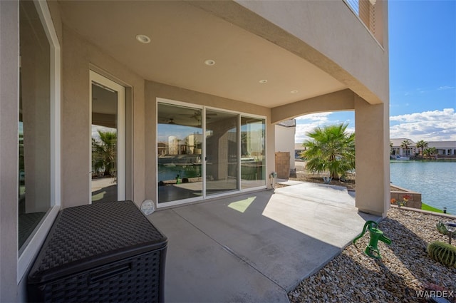 view of patio / terrace featuring a water view