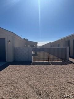 view of yard with a gate and fence