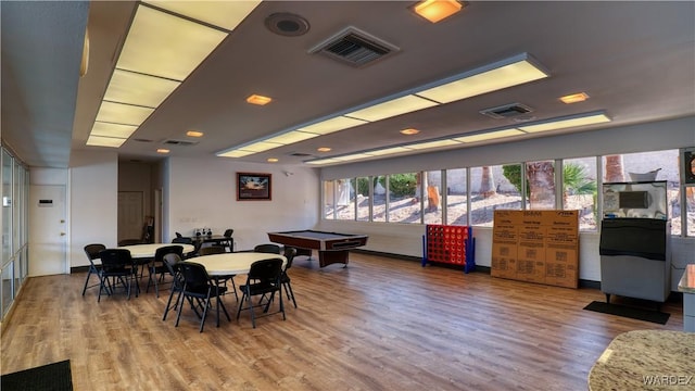 recreation room featuring light wood-style flooring and visible vents