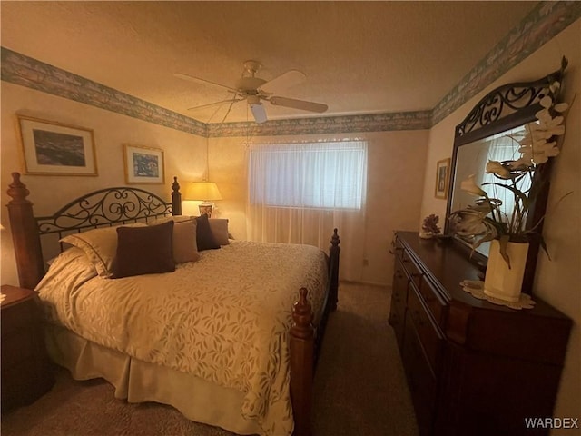 bedroom featuring carpet floors, a ceiling fan, and crown molding