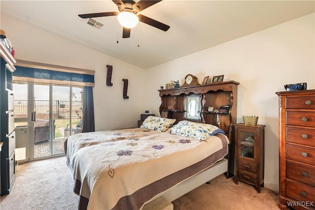 bedroom with light carpet, visible vents, ceiling fan, access to exterior, and vaulted ceiling