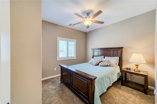 bedroom with carpet, visible vents, ceiling fan, and baseboards