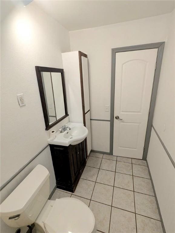 3166 E Thompson Ave, Kingman, AZ 86409 - bathroom featuring toilet, vanity, and tile patterned flooring