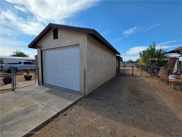 3166 E Thompson Ave, Kingman, AZ 86409 - detached garage with a gate and concrete driveway