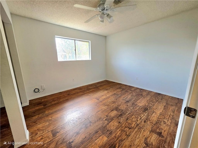 3166 E Thompson Ave, Kingman, AZ 86409 - unfurnished bedroom featuring a textured ceiling, wood finished floors, ceiling fan, and baseboards
