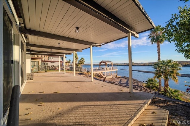 view of patio / terrace featuring a water view