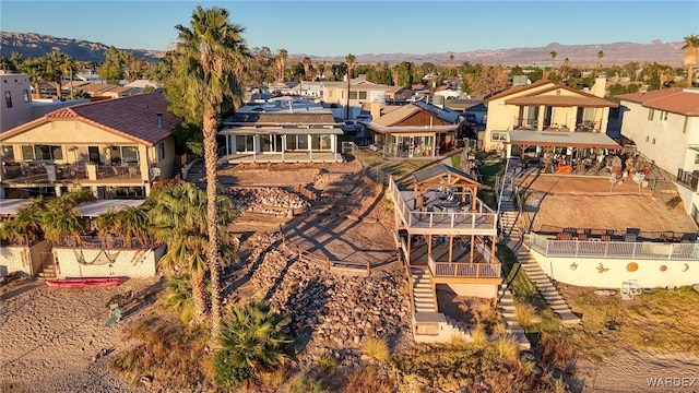 bird's eye view featuring a mountain view and a residential view