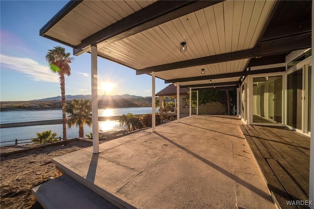 view of patio / terrace with a water view