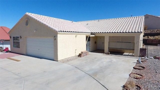 ranch-style home with fence, a tile roof, and stucco siding