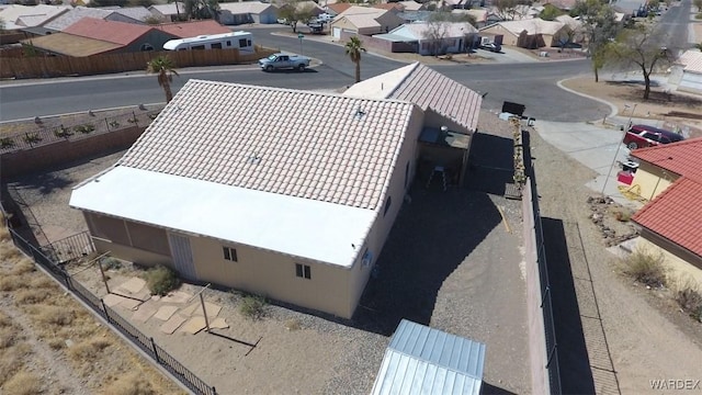 birds eye view of property with a residential view