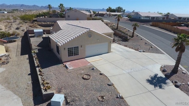 birds eye view of property featuring a residential view and a mountain view