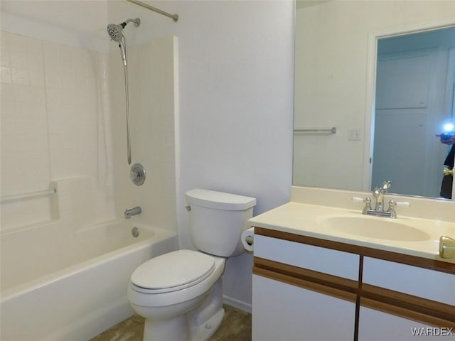 full bath featuring toilet, bathing tub / shower combination, and vanity