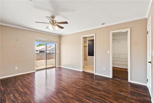 3741 June St, Bullhead City, AZ 86442 - unfurnished bedroom featuring access to exterior, ornamental molding, wood finished floors, baseboards, and a textured ceiling