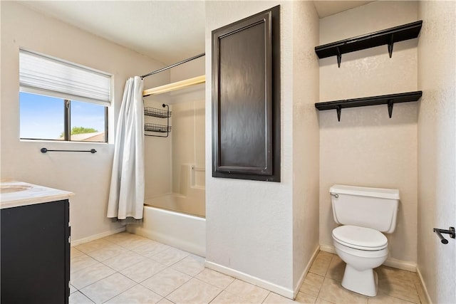3741 June St, Bullhead City, AZ 86442 - bathroom with toilet, tile patterned flooring, shower / bath combination with curtain, vanity, and baseboards