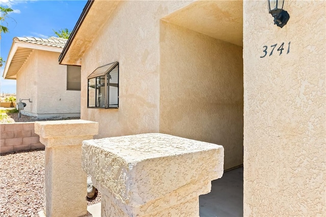 3741 June St, Bullhead City, AZ 86442 - doorway to property featuring stucco siding