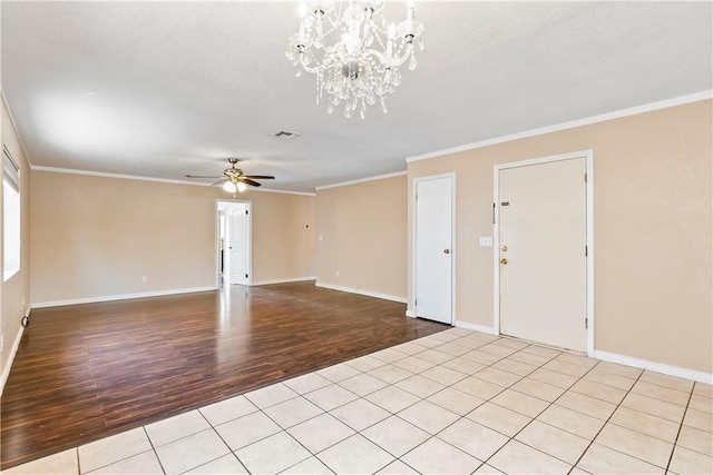 3741 June St, Bullhead City, AZ 86442 - unfurnished living room featuring light wood finished floors, ceiling fan, ornamental molding, a chandelier, and baseboards