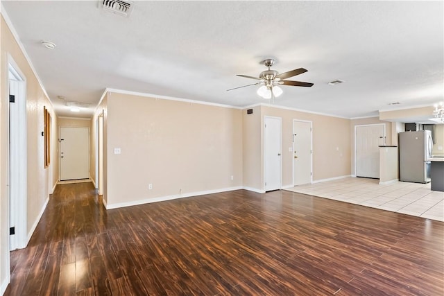 3741 June St, Bullhead City, AZ 86442 - unfurnished living room with a ceiling fan, wood finished floors, ornamental molding, and baseboards