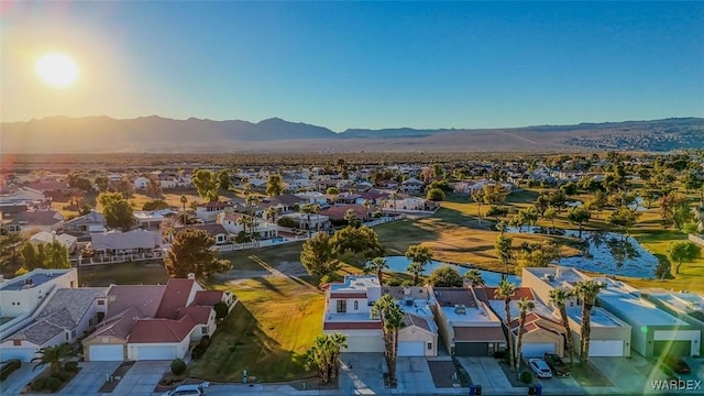 aerial view with a mountain view and a residential view