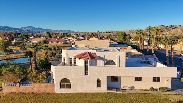 aerial view featuring a residential view and a mountain view