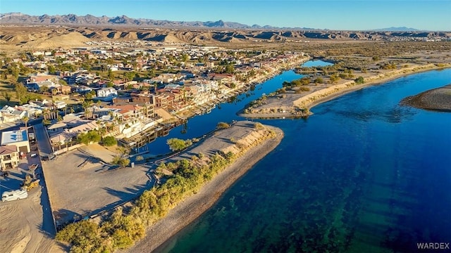 aerial view featuring a residential view and a water and mountain view