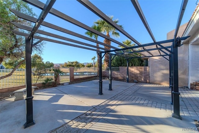 view of patio / terrace with fence and a pergola