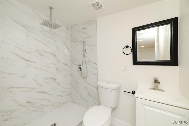 full bath with toilet, a marble finish shower, visible vents, and vanity