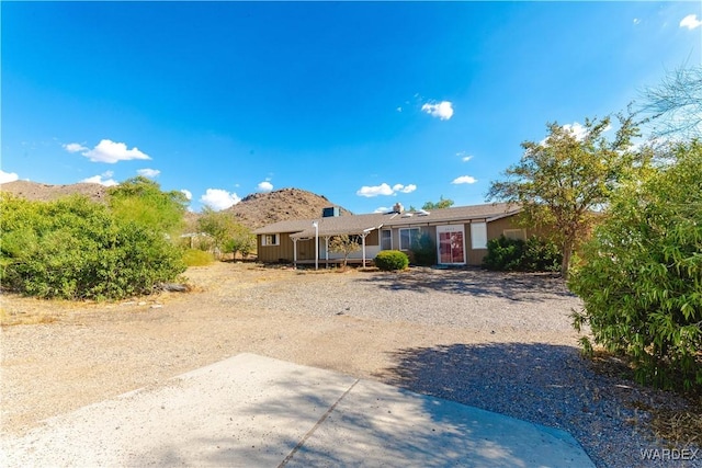 view of front of home with a mountain view