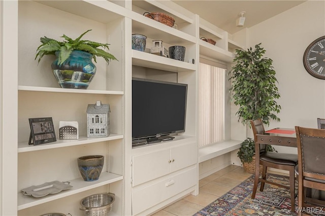 living area with light tile patterned floors