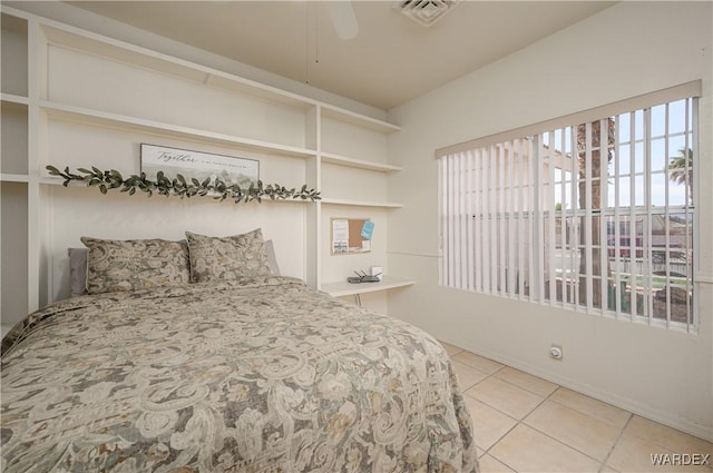 tiled bedroom featuring visible vents