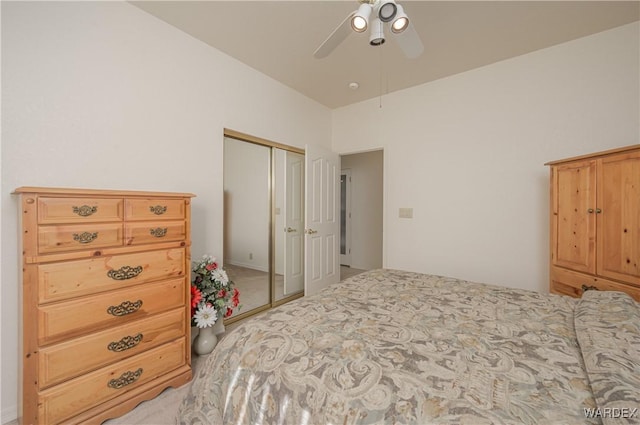 bedroom featuring a ceiling fan and a closet