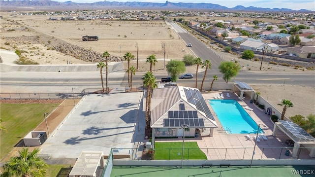 aerial view featuring a mountain view and a desert view