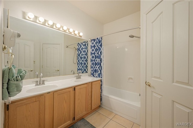 full bathroom featuring double vanity, tile patterned flooring, a sink, and shower / bathtub combination with curtain